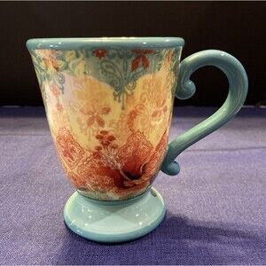Susan Winger Coffee/Tea Mug. Pedestal, Teal & Floral Design. The Studio Shop